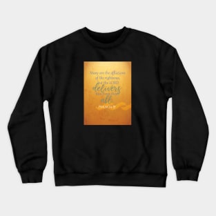 The Lord delivers us from them all!  Psalm 34:19 Crewneck Sweatshirt